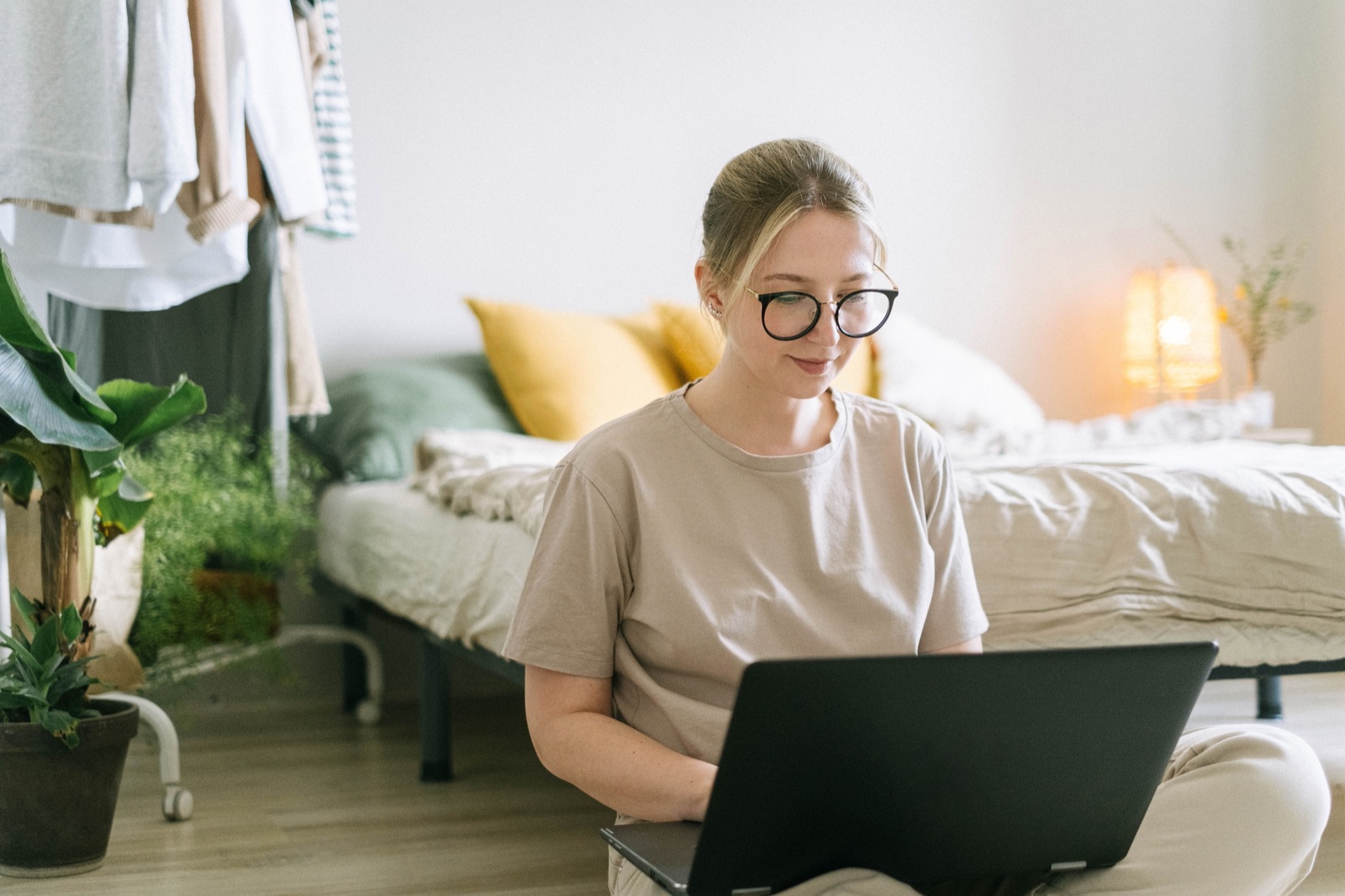 Person setting up their profile on a laptop at home